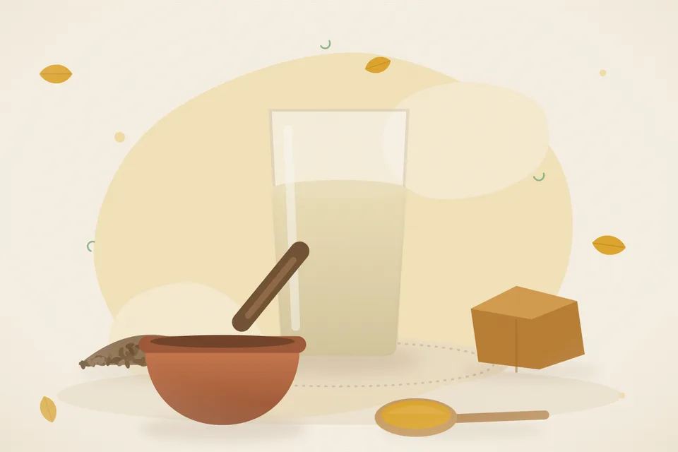 Ripe bael pulp in a bowl, cumin seeds, a small piece of jaggery and a glass of pale sherbet on a wooden board