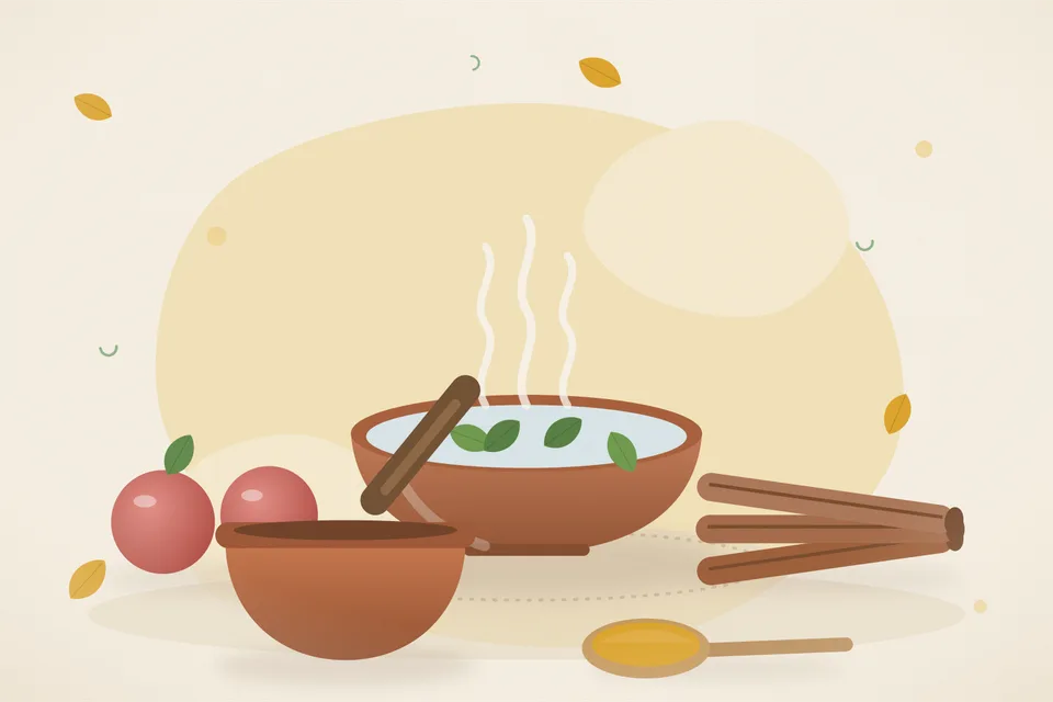 A soft steamed apple, a cinnamon stick and a small pot of water on a wooden board