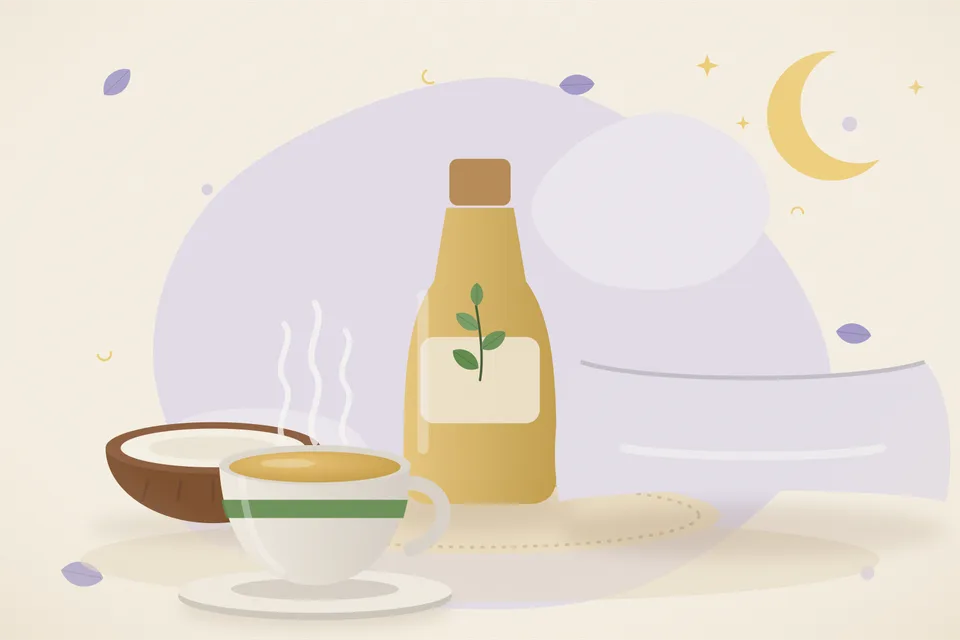 A plain glass bowl of coconut oil and a small steel spoon with a few drops, set on a cotton cloth in a kitchen.
