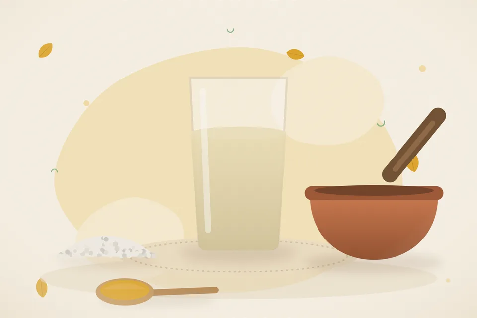 A pinch of harad powder, one crystal of mishri and a small glass of water on a brass plate