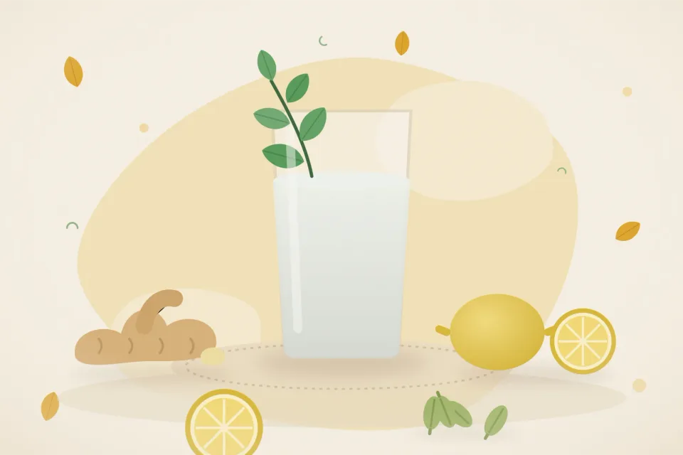 Fresh ginger with ginger candy pieces, lemon halves, green cardamom pods and a glass of water with mint on a turmeric-yellow background
