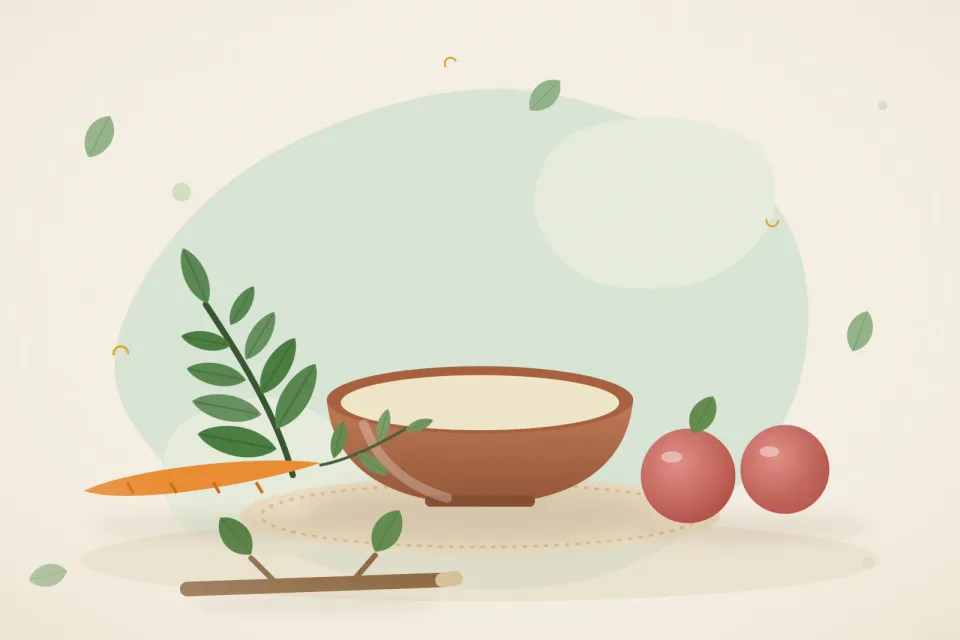 Neem twig, a carrot, guava-green apples and a small bowl of coconut oil on a light background