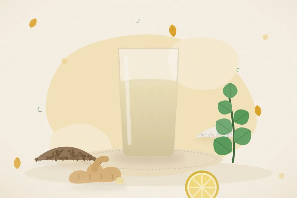 Cumin, mint, ginger, lemon and black salt beside a glass of jaljeera on a wooden board