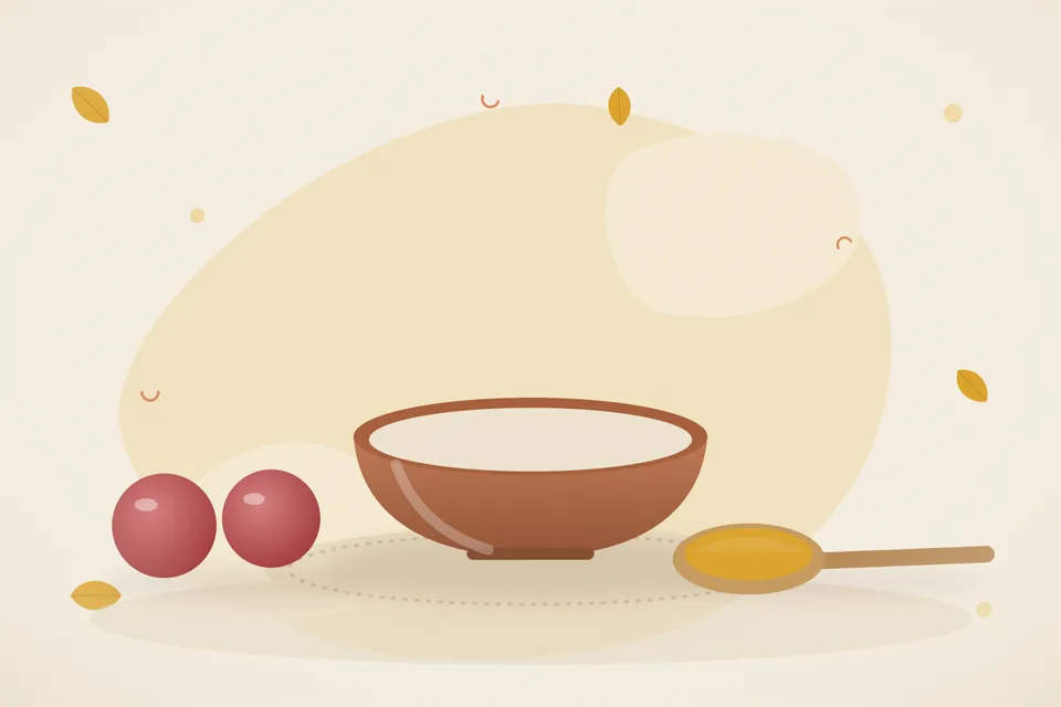 A handful of fresh pomegranate seeds in a small brass bowl on a wooden board