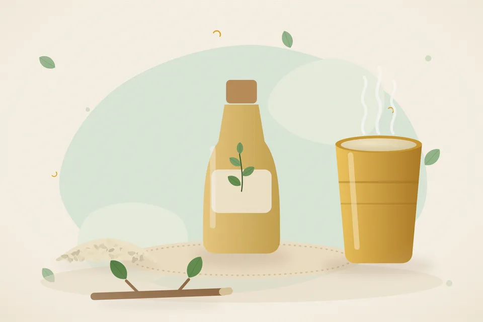 A small brass spoon of sesame oil beside a folded cotton napkin on a shelf next to a kitchen sink.