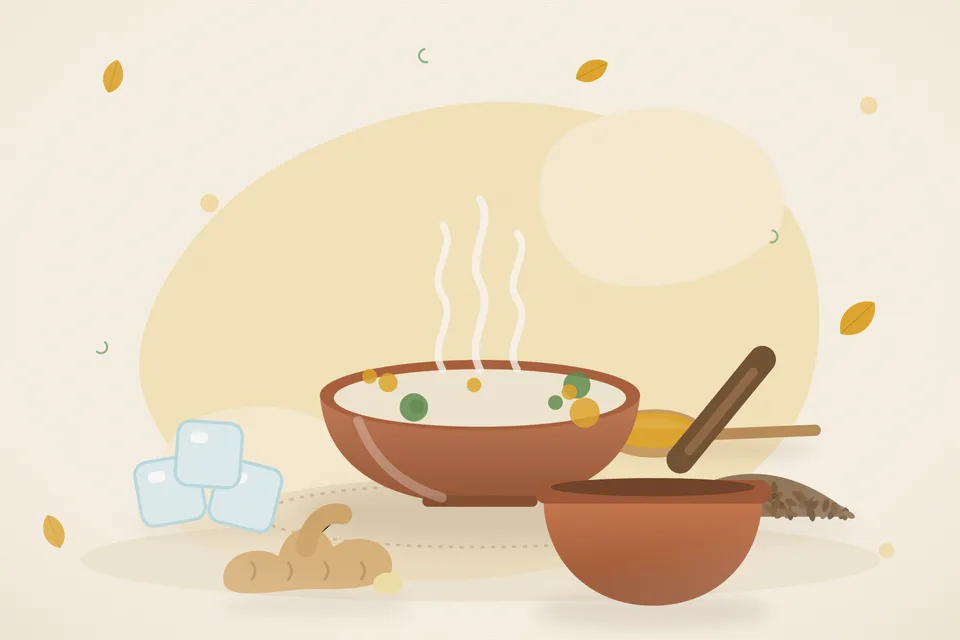 A bowl of soft rice gruel with cumin, ginger and a few drops of ghee on a wooden board