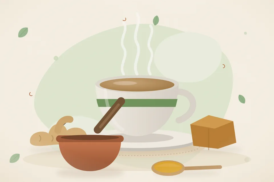 Pieces of dry ginger, a lump of jaggery and a cup of pale ginger tea on a kitchen counter, still life.