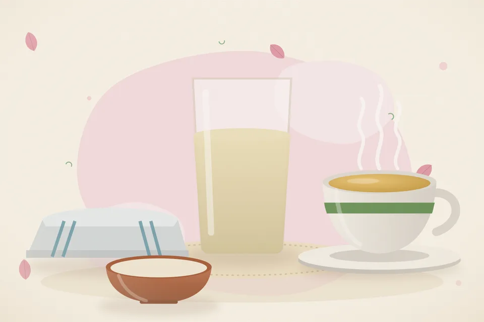 A folded cotton cloth wrapped around a rubber warm-water bag on a wooden kitchen stool, with a kettle of water nearby.